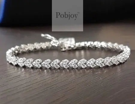 18K Gold & Diamond Heart Tennis Bracelet - Pobjoy Diamonds