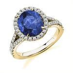 18K Yellow Gold Oval Cut Blue Sapphire & Diamond Halo Ring - 4.85 CTW - Pobjoy Diamonds