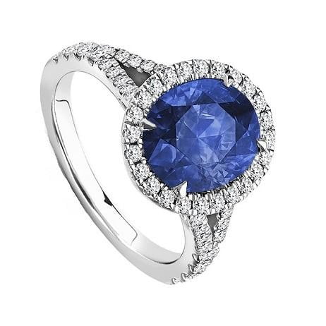 950 Platinum Oval Cut Blue Sapphire & Diamond Halo Ring - 4.85 CTW - Pobjoy Diamonds