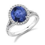 950 Platinum Oval Cut Blue Sapphire & Diamond Halo Ring - 4.85 CTW - Pobjoy Diamonds